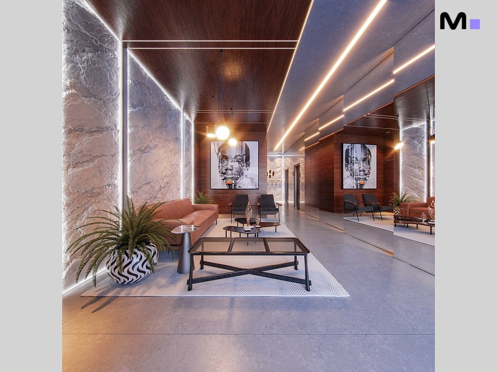 Lobby moderno do Hudson Park Residence com sofás, plantas e iluminação elegante.