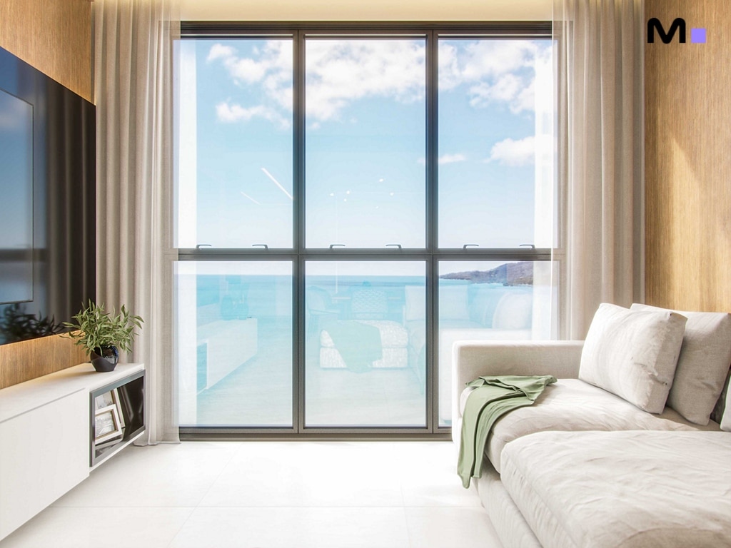 Sala de estar moderna com vista para o mar no Hudson Park Residence.