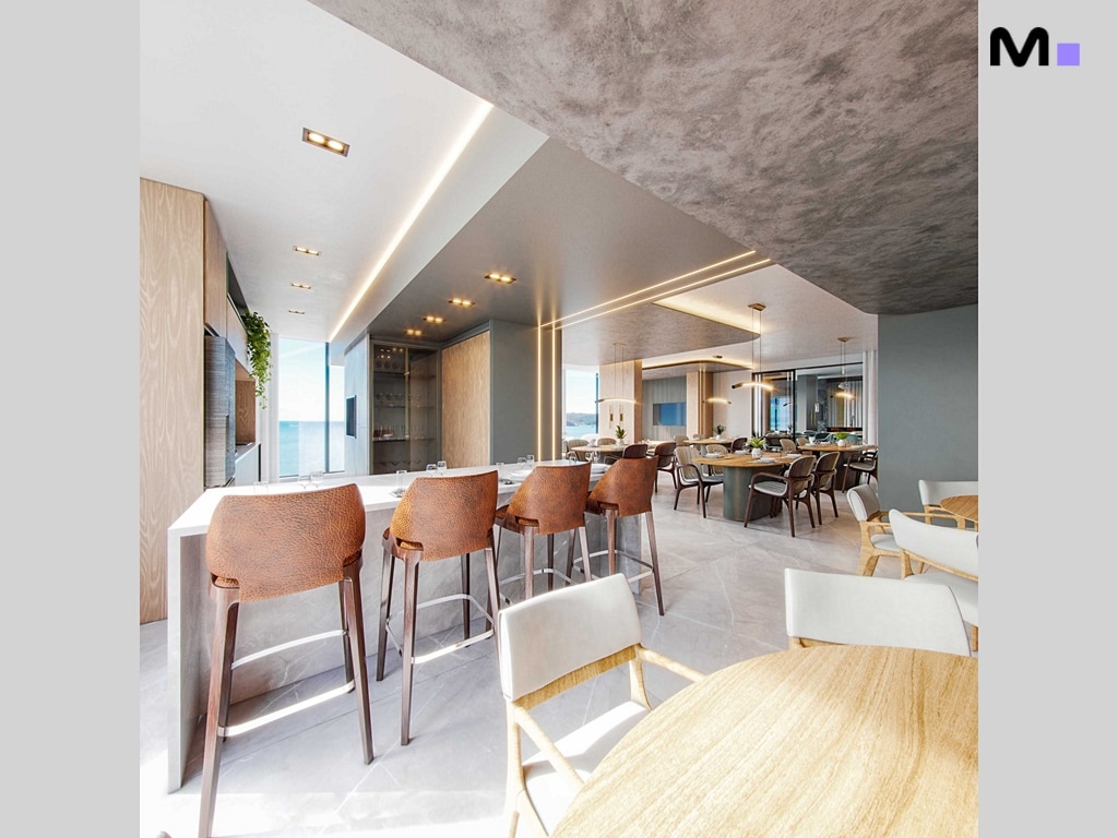 Interior moderno do Hudson Park Residence com balcão, cadeiras e vista para o mar.