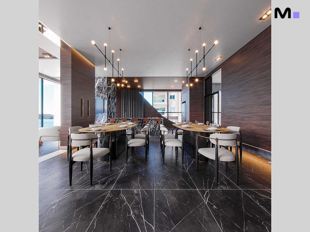 Interior moderno do Hudson Park Residence com mesas e cadeiras elegantes.