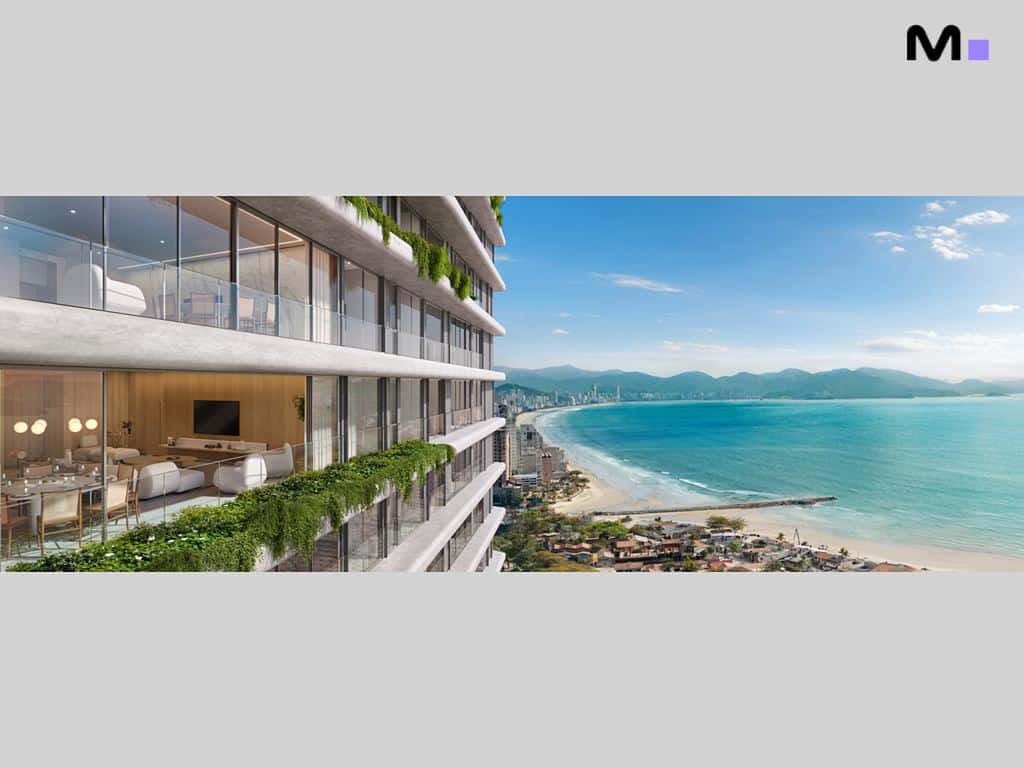 Residência Lagom Perequê com vista para o mar e varandas verdes. Arquitetura moderna e paisagem costeira.