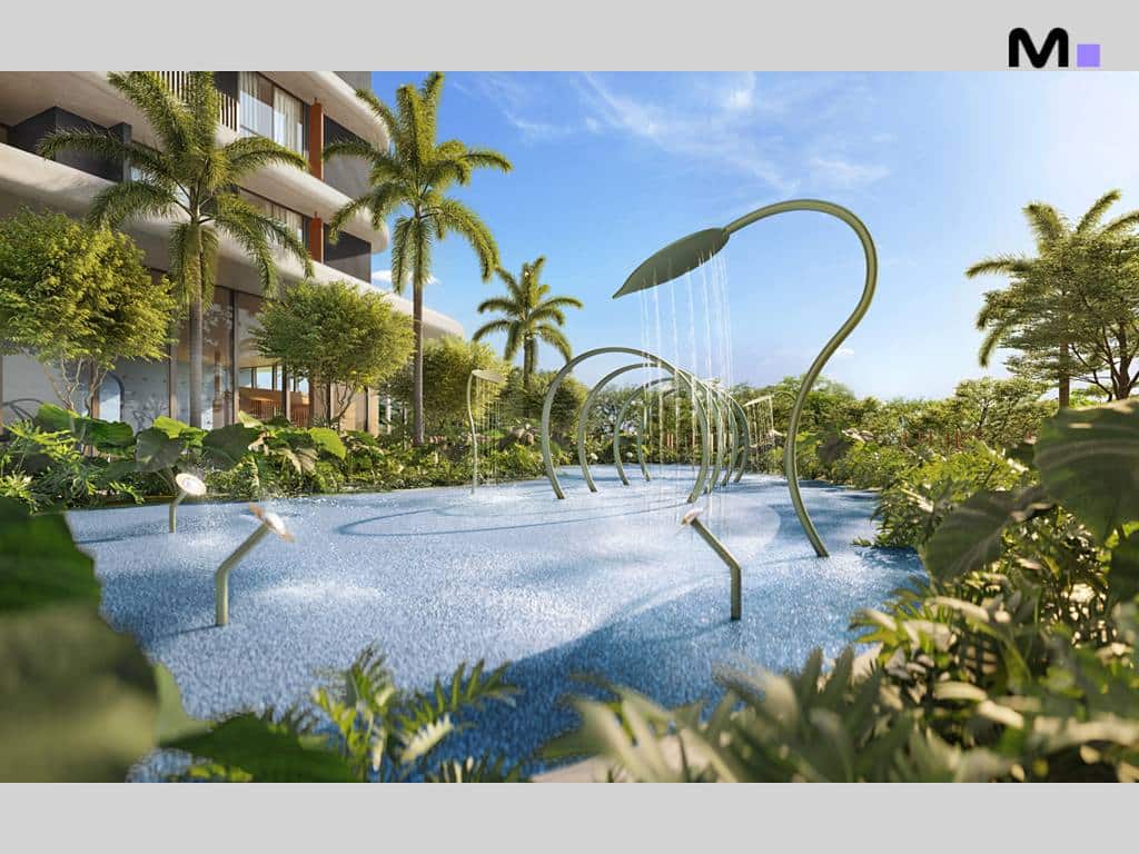 Playground aquático no Lagom Perequê Residence, com palmeiras e design moderno.