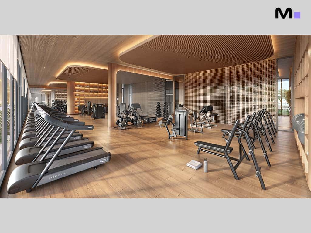 Academia moderna no Lagom Perequê Residence com esteiras, pesos e design elegante.