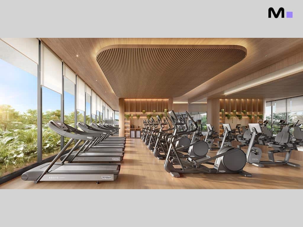 Academia moderna na Lagom Perequê Residence com esteiras e elípticos.
