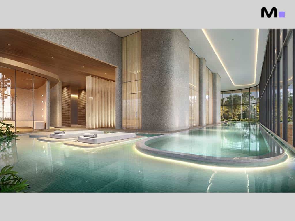 Piscina interna luxuosa no Lagom Perequê Residence, com design moderno e iluminação suave.