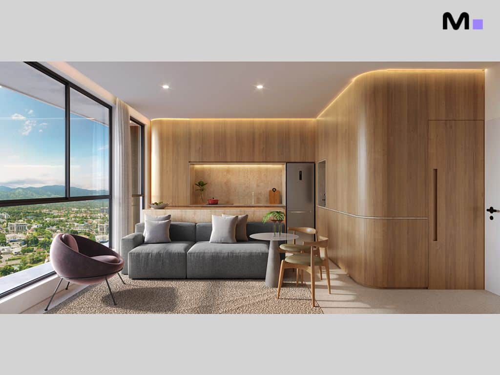 Interior do Lagom Perequê Residence com sofá cinza, mesa de jantar e vista panorâmica.