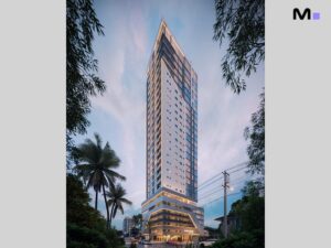 Aventador Beach Tower: Imponente arranha-céu com design moderno e iluminação noturna em área urbana arborizada.