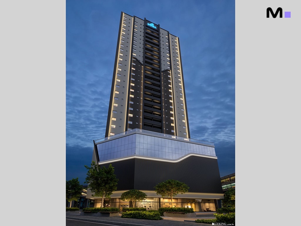 Residência Queen Tower: Vista noturna do edifício moderno e iluminado.