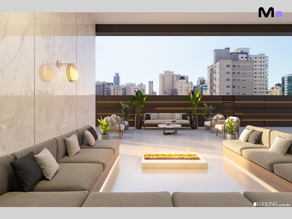 Terraço moderno do Queen Tower Residence com lareira, sofás e vista da cidade.
