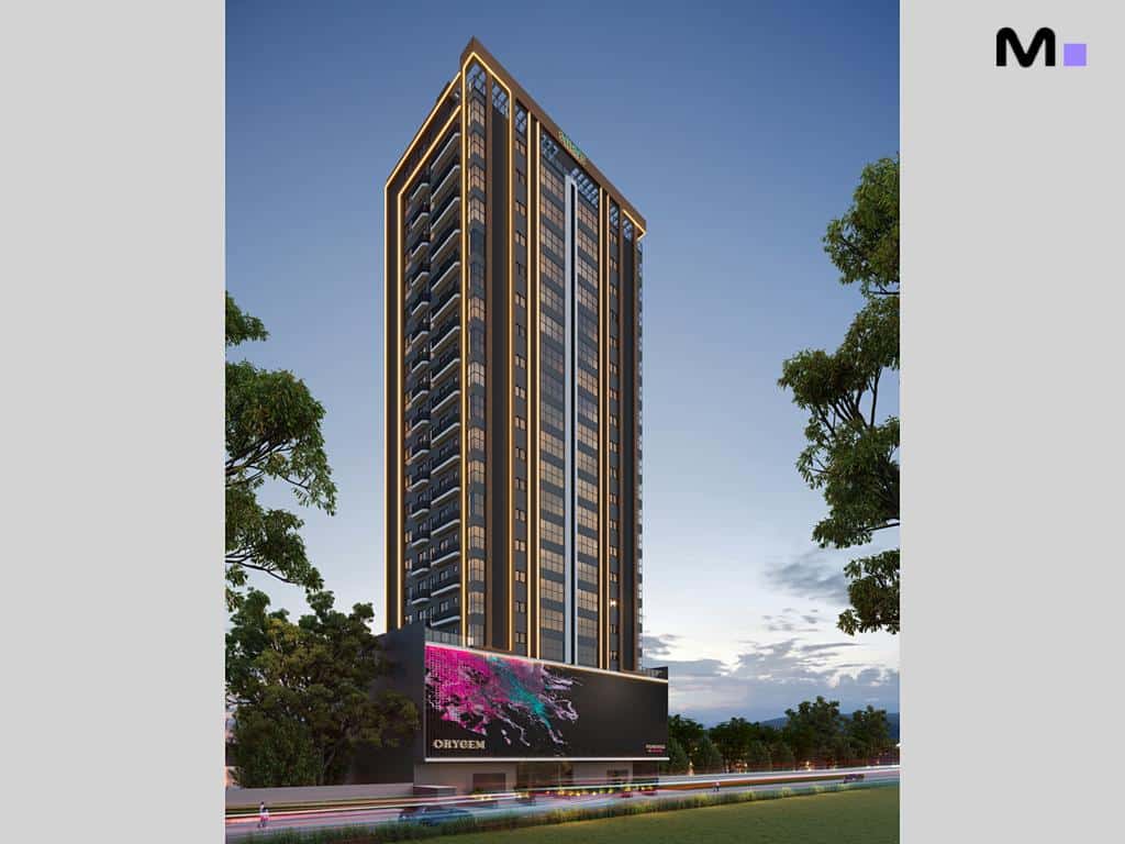 Edifício Orygem Powered by Housi, alto e moderno com design elegante e iluminação noturna.