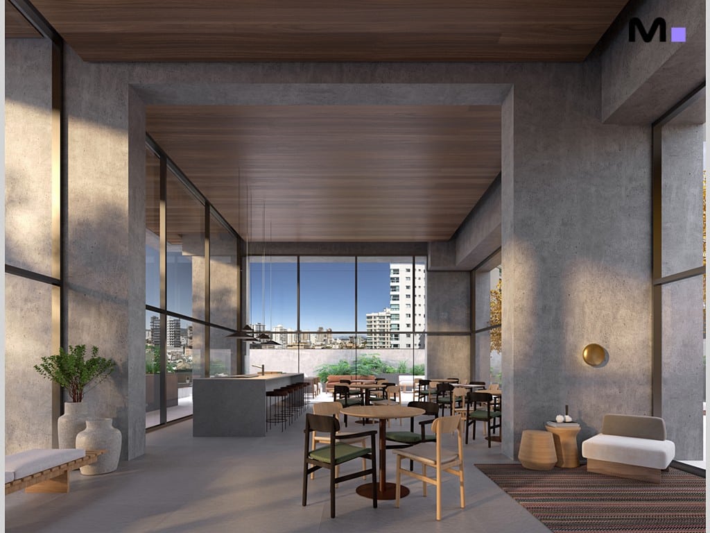 Interior elegante do Vibra Phacz Home com área de convivência, mesas e vista da cidade.