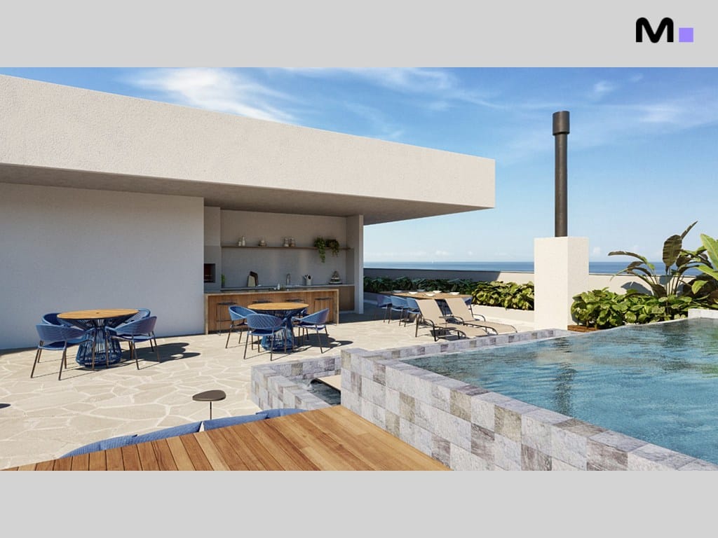 Área de lazer do Seven Residence com piscina, churrasqueira e vista para o mar.