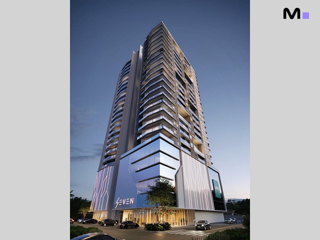 Residência Seven: Vista externa do moderno edifício alto com design elegante. SEVEN em destaque.